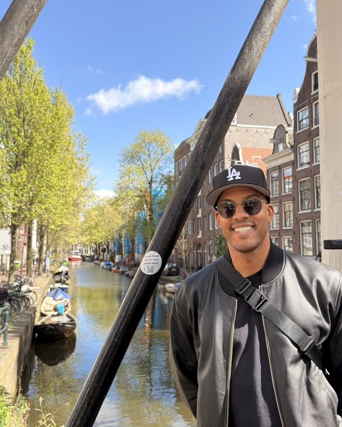 Ryan on a bridge over an Amsterdam canal
